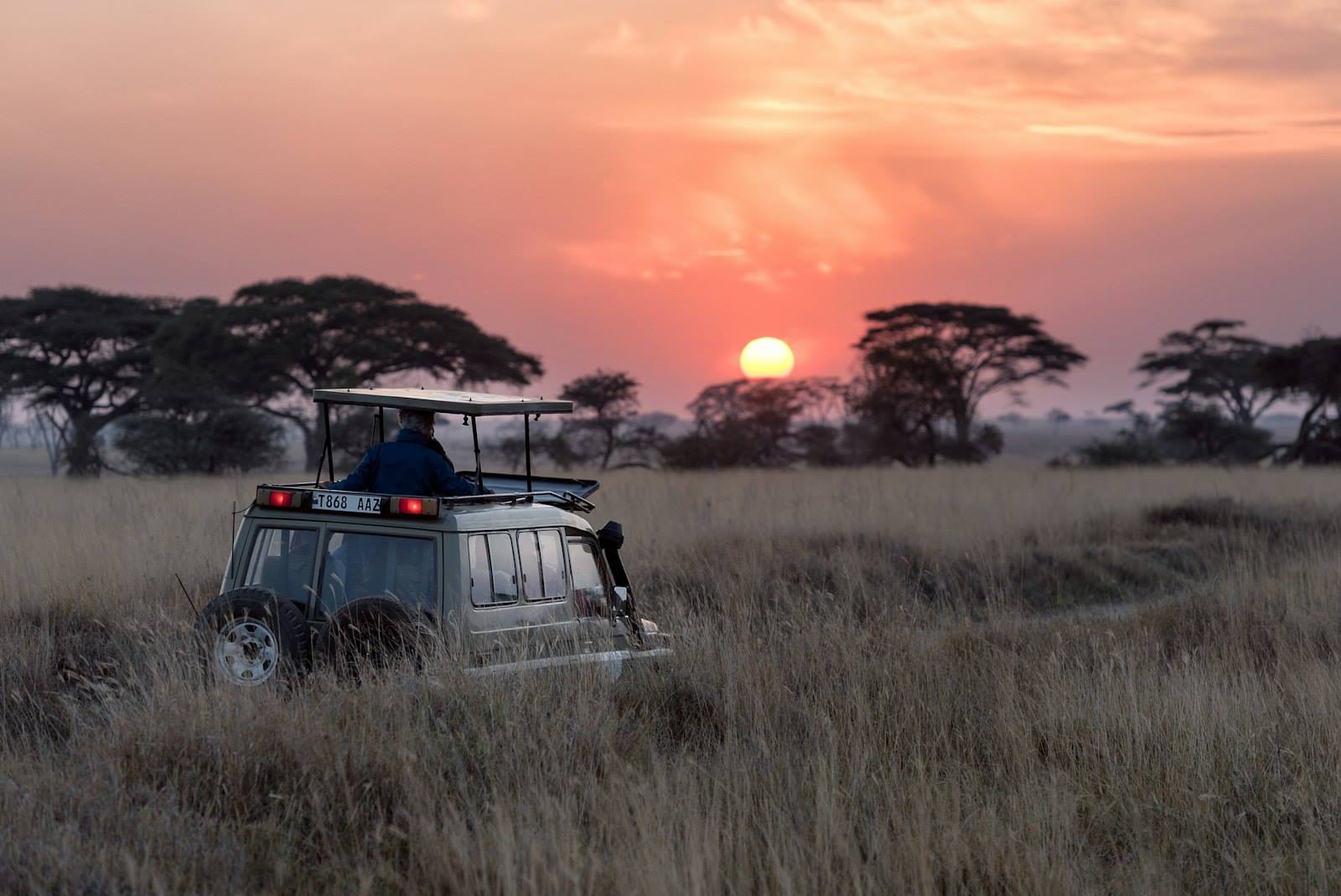 Lake Manyara National Park safari vehicle at sunset