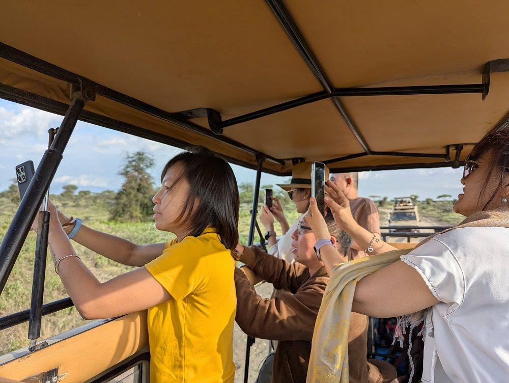 Travelers on a NGULI group day tour