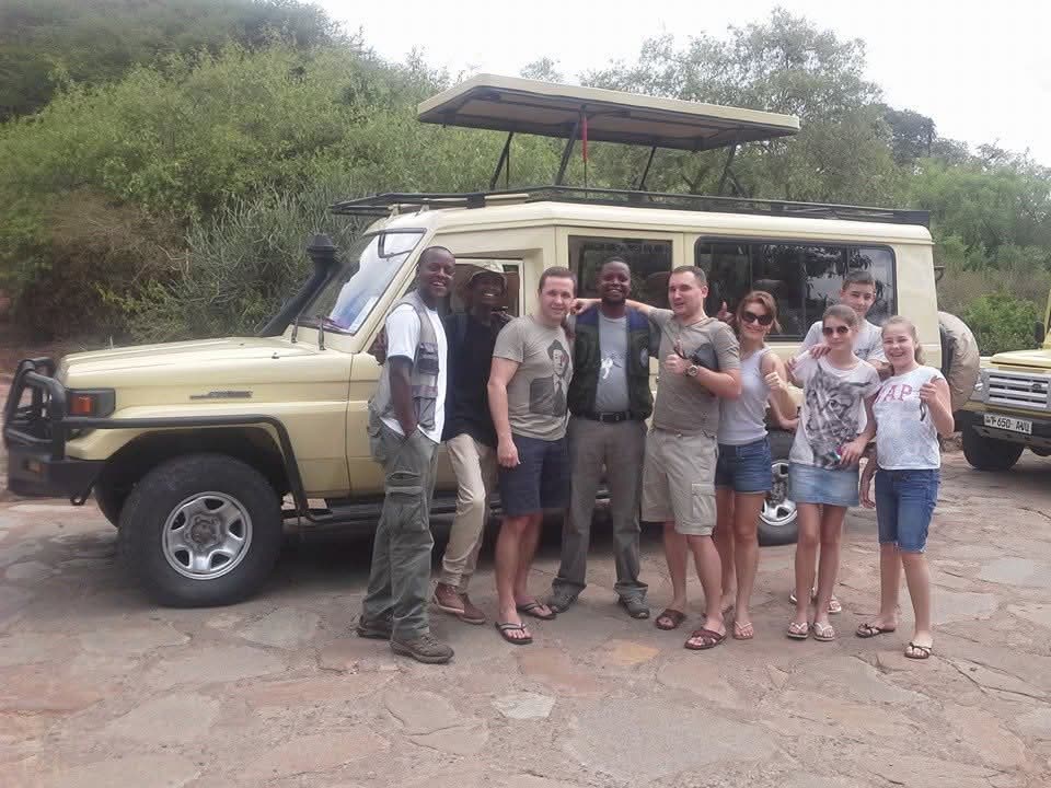 NGULI family group on safari with their vehicle